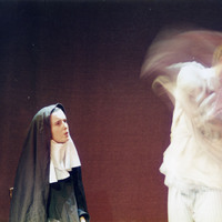 Colour close-up photograph of two actors in The Man With Two Kisses by Pan Pan Theatre Company
