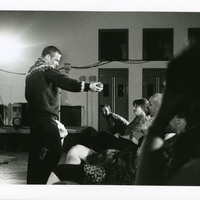 Black-and-white photograph of a performance of Standoffish by Pan Pan Theatre Company