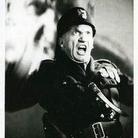Black-and-white photograph of Charles Kelly as Mussolini Frog in Cartoon by Pan Pan Theatre Company