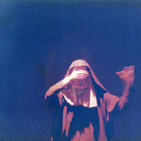 Colour close-up photograph of an actor in The Man With Two Kisses by Pan Pan Theatre Company