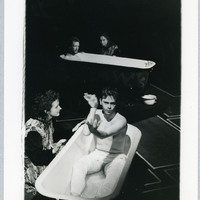 A black-and-white photograph on grey cardboard of Carmel Flanaghan and Senan Dunne in Pan Pan Theatre Company's The Crystal Spider