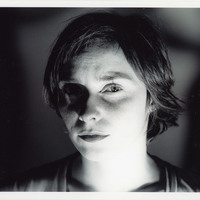 Black-and-white headshot of one of the actors featured in Mac-beth 7 by Pan Pan Theatre Company