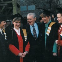 Dr. Brendan O'Regan with students on graduation day