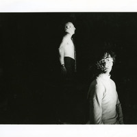 Black-and-white photograph of Charles Kelly and a second actor in A Bronze Twist of your Serpent Muscles by Pan Pan Theatre Company