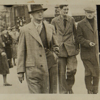 Black and white photograph of Arthur Shields, Lennox Robinson and Sean O'Casey walking down a city street.