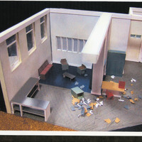 Print-outs of colour photographs of the set model-box