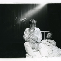 Black-and-white photograph of two actors in The Man With Two Kisses by Pan Pan Theatre Company