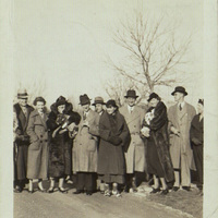 Black and white photograph of Aideen O'Connor, Arthur Shields and several other Abbey actors standing outside.