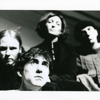 Black-and-white photograph of part of the cast of Tailors Requiem by Pan Pan Theatre Company