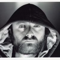 Black-and-white headshot of one of the actors featured in Mac-beth 7 by Pan Pan Theatre Company
