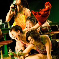 Colour photograph of a performance of The Playboy of the Western World at the Project Arts Centre, Dublin by Pan Pan Theatre Company, first performed at the Orienal Pioneer Theatre, Beijing