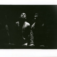 Black-and-white photograph of Charles Kelly as 'The Master' during a performance of Tailors Requiem by Pan Pan Theatre Company