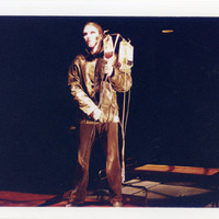 Colour photograph of Mark McCaffrey as 'No.252' in Tailors Requiem by Pan Pan Theatre Company