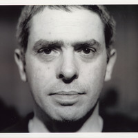 Black-and-white headshot of one of the actors featured in Mac-beth 7 by Pan Pan Theatre Company